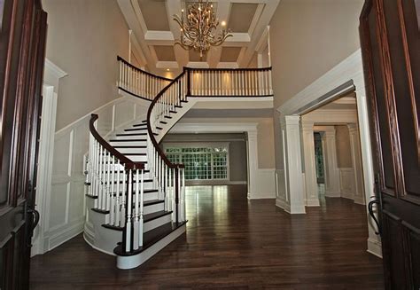 Open Foyer With Curved Staircase For The Home Pinterest