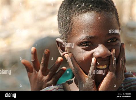 A Young Boy Play Up To The Camera On Likoma Island Lake Malawi Africa