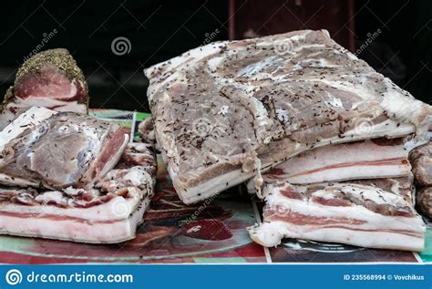 Large Chunks Of Fresh Salted Bacon On The Counter In The Village Market