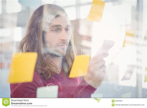 Businessman Holding Sticky Note Stuck Glass Stock Photos Free Royalty Free Stock Photos From