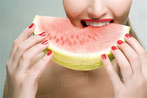 Woman Eating Watermelon Stock Photo Dissolve