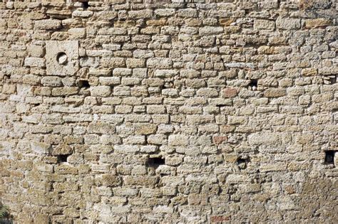 Old Stone Wall Built Of Limestone Bricks Stock Photo Image Of
