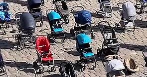 Strollers in Lviv mark deaths of Ukraine children