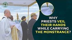 Why priests veil their hands while carrying the monstrance