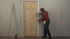 Beginners Learn how to Install a Door in 4 Minutes, without Shimming!