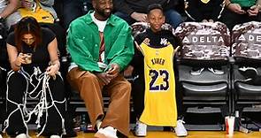 Dwyane Wade Steps Out With His Youngest Son Xavier For A Lakers Game | Essence