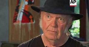 Neil Young acknowledges he and Daryl Hannah are married
