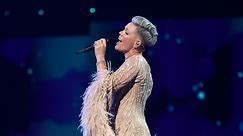 Pink pays tribute to Dame Olivia Newton-John at AMAs with performance of 'Hopelessly Devoted To You'