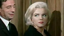 Marilyn Monroe and Yves Montand making love in a lift. "Let's Make Love" 1960