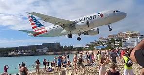 Extremely Low Landing at St Maarten Princess Juliana Airport- American Airlines A319