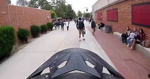 Man rides motorcycle through Hart High School