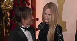 Nicole Kidman kisses Keith Urban on Oscars red carpet