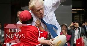 Boris Johnson takes out boy in rugby - BBC News