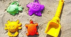 Video per bambini con i giochi con la sabbia. Giocattoli al mare. Impariamo le forme e i colori