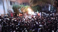 Senegalese celebrate outside Ousmane Sonko's home following his release | AFP