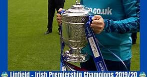 Linfield captain Jamie Mulgrew lifts the Gibson Cup