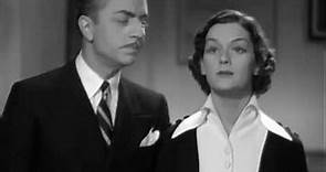 Rosalind Russell Gives William Powell a Present