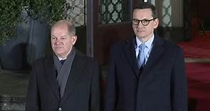 German Chancellor Olaf Scholz welcomed by Polish Prime Minister in Warsaw | AFP