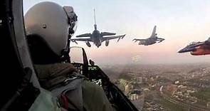 F16 pilot flies in a squadron formation over Amsterdam. See what he sees.