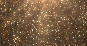 Beautiful Gold Glitter Particle Rain Falling Shimmers Sparkle Light 4K DJ Visuals Loop Background