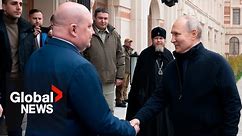 Putin visits Crimea on annexation anniversary as he faces ICC arrest warrant