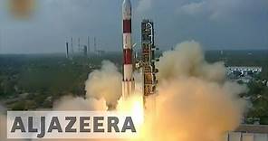 India launches record 104 satellites into orbit