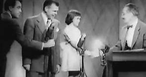 Groucho sings with his daughter, Melinda, 8