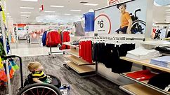 Boy in wheelchair stares in awe at Target ad that features a boy just like himself