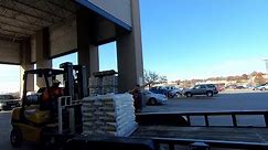 At LOWES loading a palette of 60# Cement bags. Watch to the end OMG!