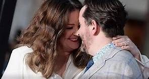 Melissa McCarthy kissing Ben Falcone in the Heat