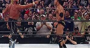 Hulk Hogan "hulks up" against The Rock at WrestleMania X-8