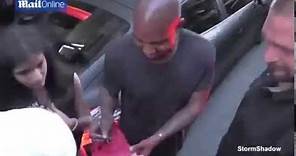 Kanye West Signs Fake Red October Yeezys