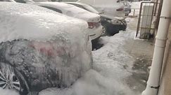 Car leaves behind frozen shell after thick front accumulated on its rear