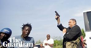 Haitian senator opens fire during protest near parliament