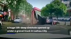 13ft-deep sinkhole opens up and swallows gravel truck