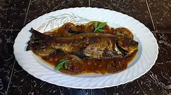 Baked Tench stuffed with walnuts and raisins Bulgaria