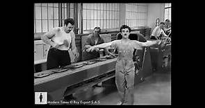 La scena della catena di montaggio nel film “Tempi Moderni” di Charlie Chaplin del 1936