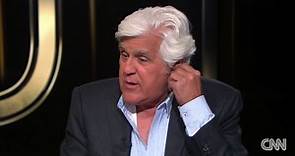 Jay Leno shows his new ear after accident