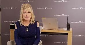 Dolly Parton sings and gets COVID vaccine shot