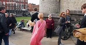 Pixie Geldof appears camera-shy as she departs royal wedding