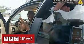 Video of George Floyd detained at gunpoint shown to US jury - BBC News