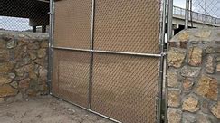 Chain link door with winged slats installation Get a quote! 📞9153053008. @thelonestarfencing #915 #metalbarriers #barricades #metalfence #elpasotexas #elpasotx | The Lone Star Fencing
