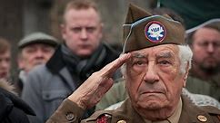 WWII paratrooper famous for bringing beer to wounded troops dies at 98