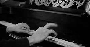 Go West (1940) - Chico Marx at the piano