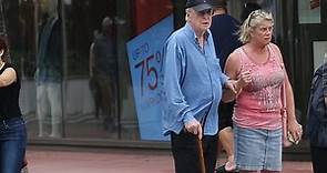 Michael Caine gets help to lunch from daughter Nikki in Miami