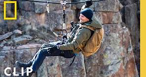 Bradley Cooper attempts to cross a snowy ravine on his own | Running Wild with Bear Grylls