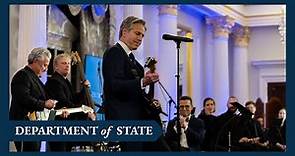 Secretary of State Blinken plays guitar at the launch of the Global Music Diplomacy Initiative