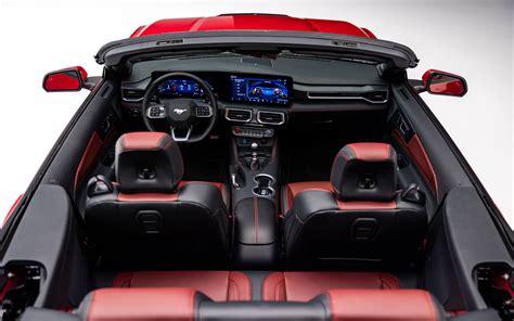 Driver's perspective inside a 07 Ford Mustang Convertible with the top down