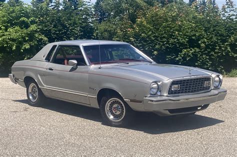 A 1975 Ford Mustang II Hatchback in a metallic brown, highlighting its more compact design
