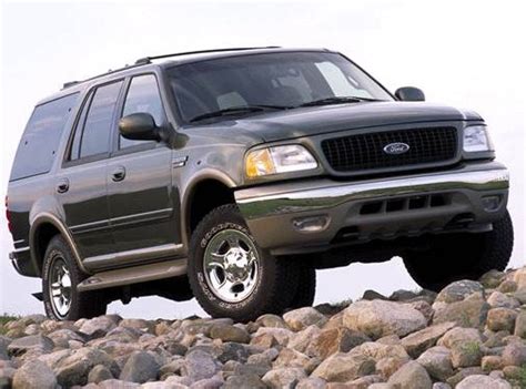 Front view of a modified 2002 Ford Expedition showcasing a custom badgeless grill